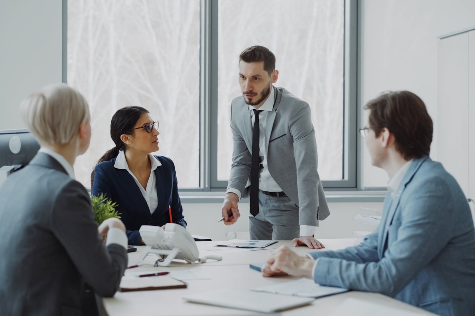 Energy-sector business leaders meeting around a conference table